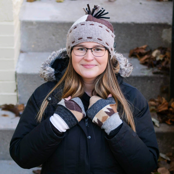 woman wearing upcycled wool ski hat and fingerless gloves