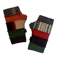 A pair of patchwork knit fingerless gloves in earthy, multi-colored tones including green, red, brown, beige, and black, shown on a plain white background.