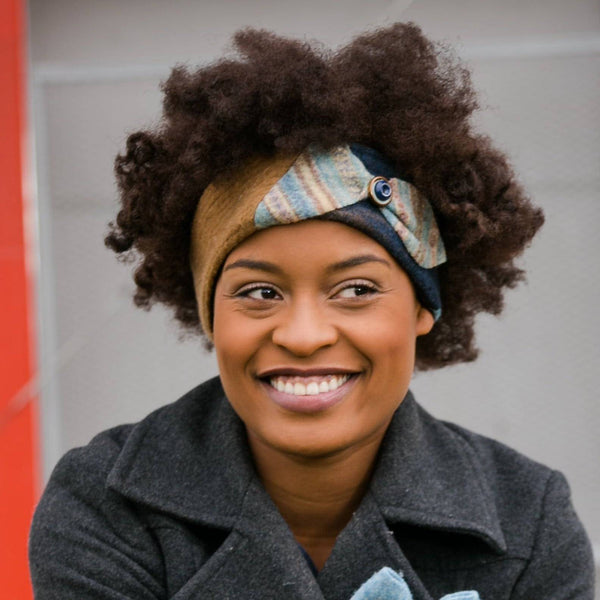 woman smiling wearing upcycled wool headband